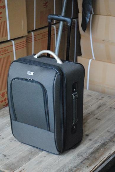 photo of suitcase with wheels